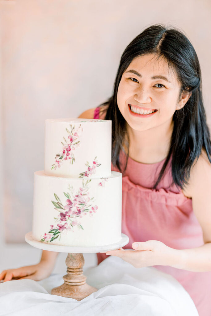 Maggie and 2 tier buttercream painted cake